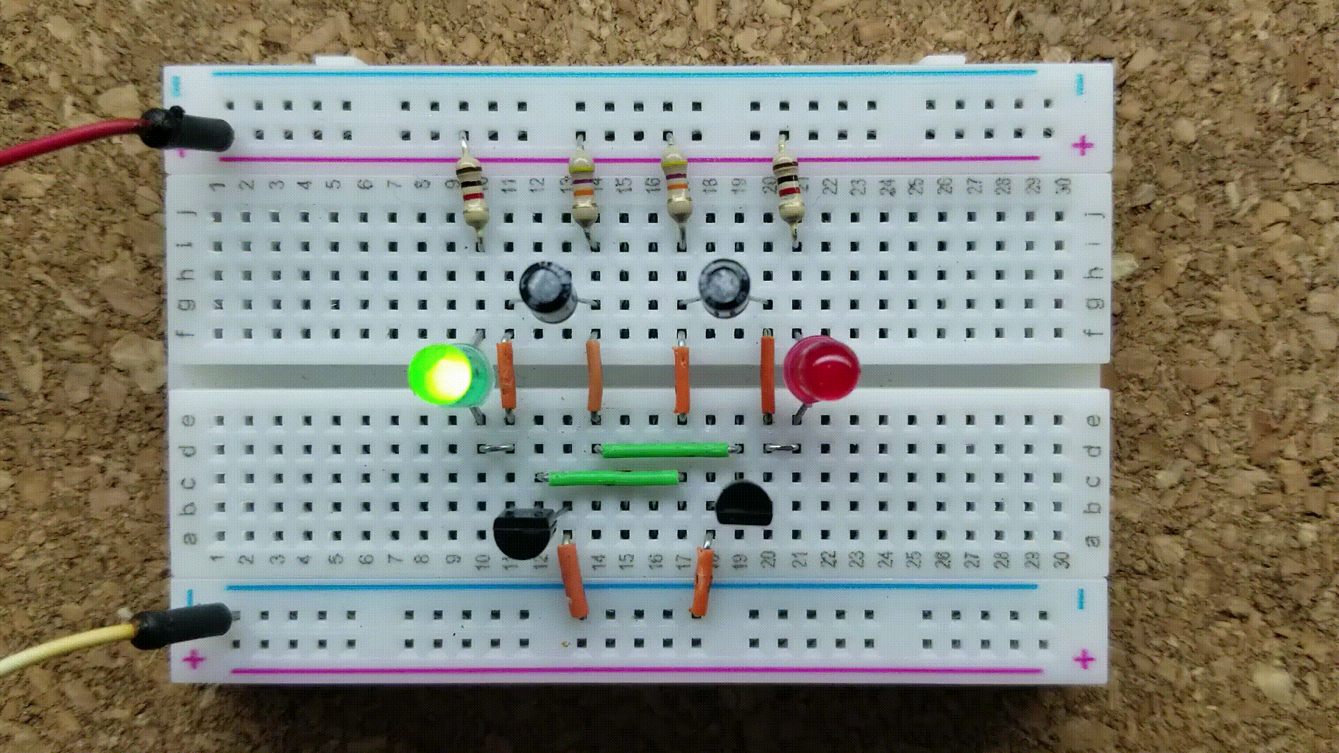 Astable multivibrator blinking LEDs on a breadboard