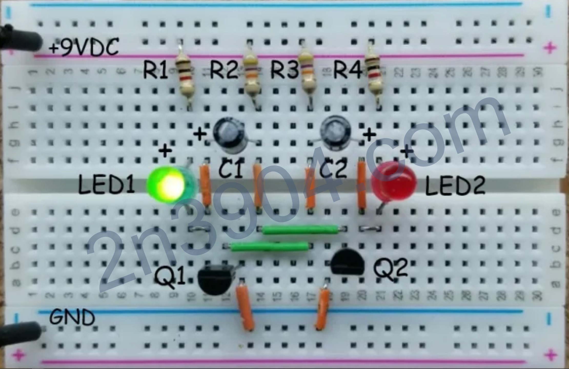 Astable multivibrator breadboard layout using 2N3904 transistors